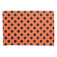 Black polka dots on orange