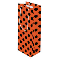 Black polka dots on orange