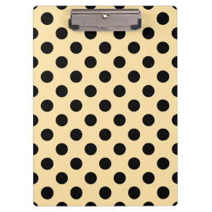 Black polka dots on pale yellow clipboard