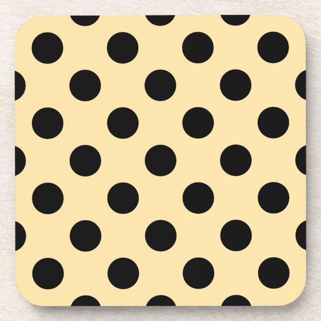 Black polka dots on pale yellow coaster (Front)