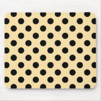 Black polka dots on pale yellow
