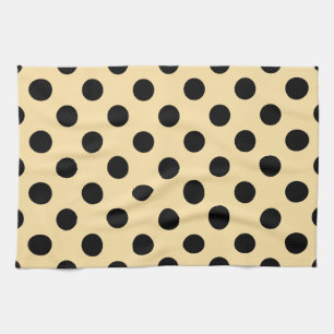 Black polka dots on pale yellow tea towel