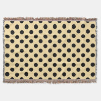 Black polka dots on pale yellow