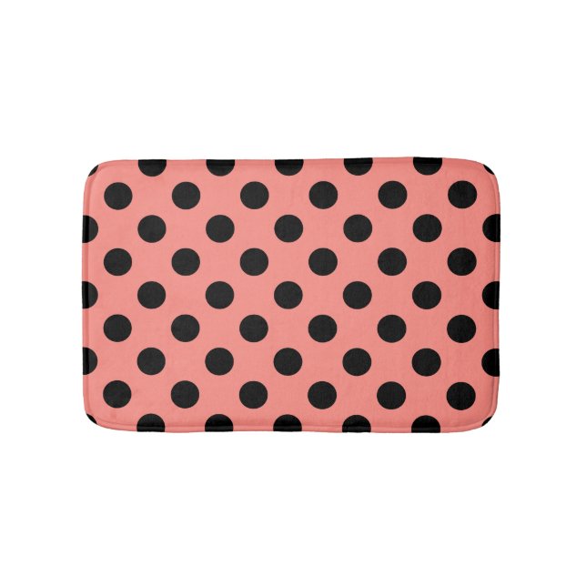 Black polka dots on peach bath mat (Front)