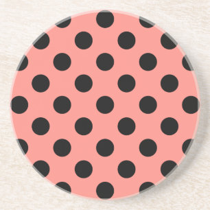 Black polka dots on peach coaster