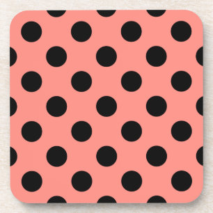 Black polka dots on peach coaster