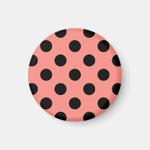 Black polka dots on peach magnet