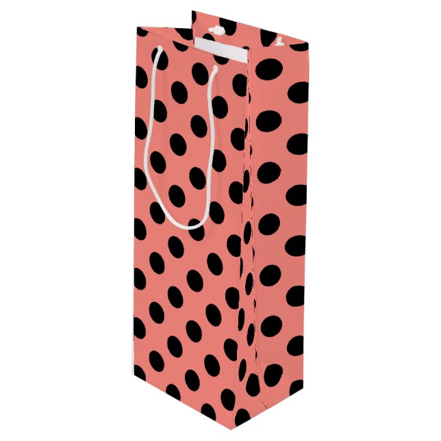 Black polka dots on peach wine gift bag (Front Angled)
