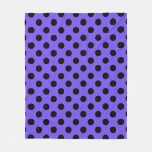Black polka dots on periwinkle fleece blanket
