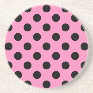 Black polka dots on pink coaster