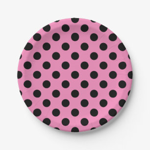 Black polka dots on pink paper plate