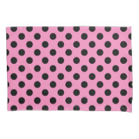 Black polka dots on pink