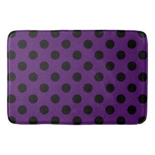 Black polka dots on plum purple bath mat