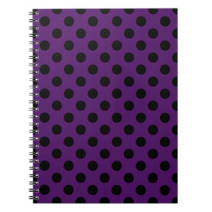 Black polka dots on plum purple notebook