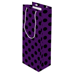 Black polka dots on plum purple wine gift bag