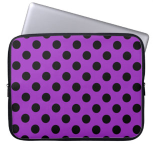 Black polka dots on purple laptop sleeve