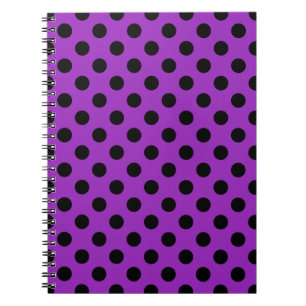 Black polka dots on purple spiral notebook