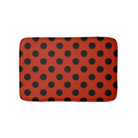 Black polka dots on red