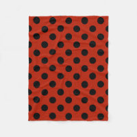 Black polka dots on red
