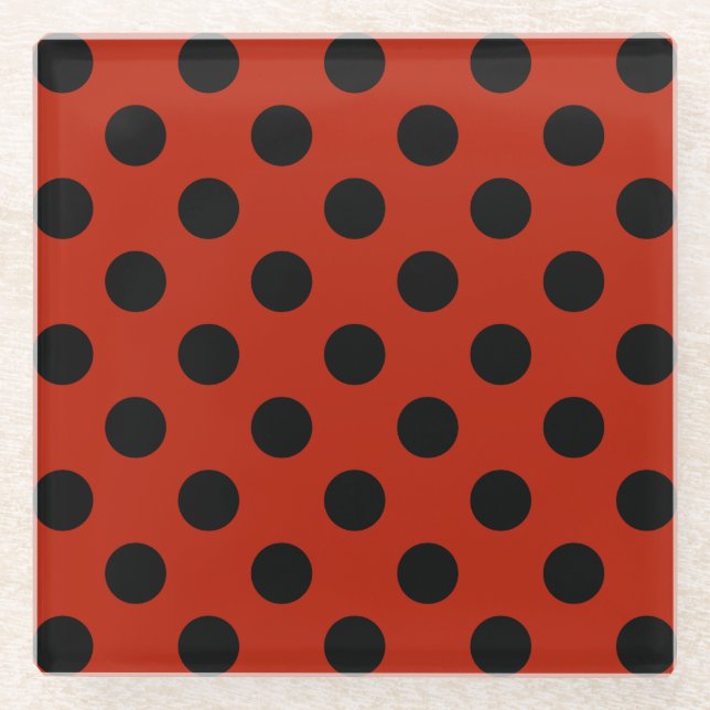 Black polka dots on red glass coaster (Front)