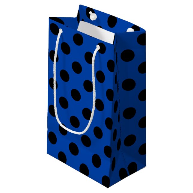 Black polka dots on royal blue small gift bag (Front Angled)