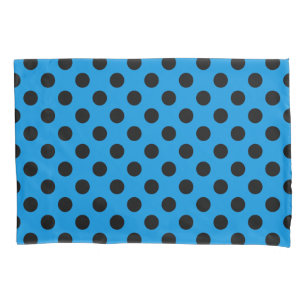 Black polka dots on sky blue pillowcase