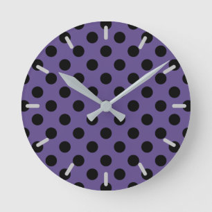 Black polka dots on ultra violet round clock