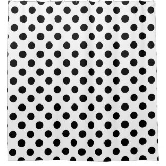 Black polka dots on white shower curtain