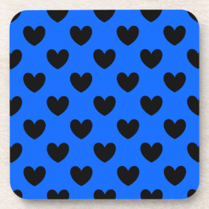 Black polka hearts on blue coaster