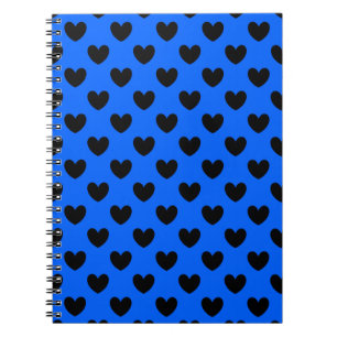 Black polka hearts on blue notebook