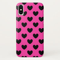Black polka hearts on fuchsia pink