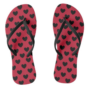 Black polka hearts on red jandals