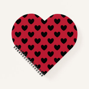 Black polka hearts on red notebook