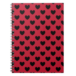Black polka hearts on red spiral notebook