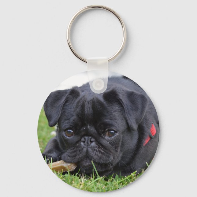 black pug laying key ring (Front)
