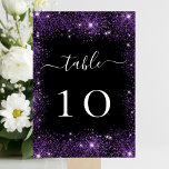 Black purple glitter sparkle wedding table number<br><div class="desc">A black background decorated with purple faux sparkles.  White text.
  

Personalise and add your table numbers.  Add your numbers one by one.</div>