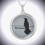 Black Raven Silhouette Customisable Silver Plated Necklace<br><div class="desc">This dramatic grey and black pendant necklace features the silhouette of a solitary Raven perched on a wire against a grey sky. It quotes The Raven Nevermore, but can be personalised with a Name. Throughout history and world cultures, the raven is found in lore, mythology and literature. The raven's symbolism...</div>