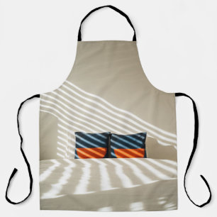 Black red and white plaid textile on white bed apron