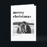 Black Retro Bold Typography Merry Christmas Photo Holiday Card<br><div class="desc">Merry Christmas! Send your holiday wishes to family and friends with this customisable modern Christmas card. It features retro bold typography with a Christmas tree accent. Personalise this photo holiday card by adding your own details. This black and white Christmas card is available in other colours.</div>