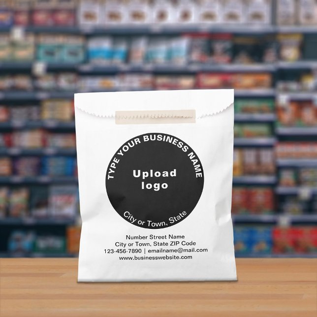 Black Round Business Brand on Paper Bag (Paper bag with black round business branding displayed in a store)