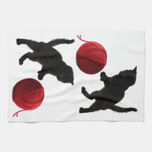 Black Silhouette Kitty, with red wool Ball Tea Towel