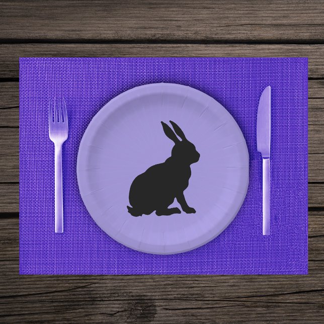 Black Silhouette Sitting Rabbit on Purple Paper Plate (Black silhouette sitting bunny rabbit on light purple paper party plates.)