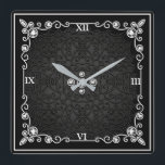 Black & Silver Art Deco Wall Clock<br><div class="desc">This clock is made to look as if it came from the art deco period - with a lot of metallic and gemstones for the richness. This clock makes great gifts for people buying a new home or re-decorating the home they're in. You can find this clock at Home Comfort...</div>