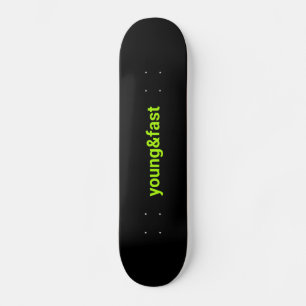 Black skateboard with a print "young and fast".