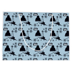 Black ski equipment & snowflakes on blue large gift bag