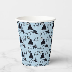 Black ski equipment & snowflakes on blue paper cups