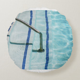 Black strap on blue swimming pool round cushion