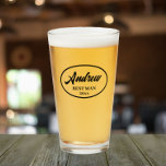 Black Stylised Name Wedding Best Man Glass<br><div class="desc">Beer glass for the wedding Best Man that features his name printed in black,  stylised script inside a black bordered oval along with wedding year date. Personalise your beer glass by editing and replacing name and date with your own.</div>