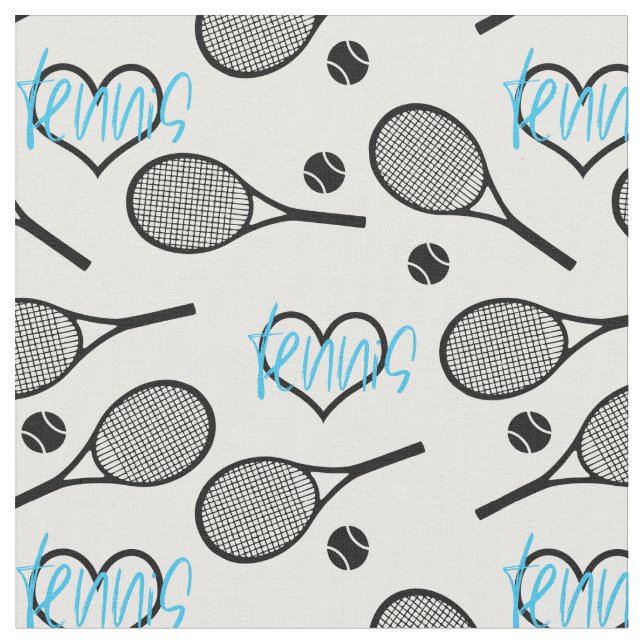 Black tennis rackets on white fabric (Close Up)