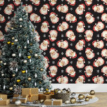 Black Vintage Santa Claus Christmas<br><div class="desc">Bring the magic of the holidays into your home with this black vintage Santa Claus Christmas wallpaper. Featuring charming illustrations of Santa's cheerful face and delicate snowflakes against a black background, this design adds a festive and nostalgic touch to any room. Perfect for creating a cosy and merry atmosphere, this...</div>